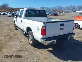 2014 Ford Super Duty F-250 SRW XL with VIN 1FT7W2BT6EEA87011, listed as a IAAI auction lot 41695220 with 130,299 mi miles. Bid and sale history available at carsss.com. Image 3.