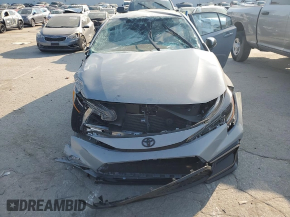 2022 Toyota Corolla SE with VIN 5YFS4MCE6NP121446, listed as a Copart auction lot 69146444 with 29,952 mi miles and Salvage Title. Bid and sale history available at carsss.com. Image 5.