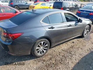 2015 Acura TLX with VIN 19UUB1F31FA023293, listed as a IAAI auction lot 40310652 with 117,350 mi miles. Bid and sale history available at carsss.com. Image 4.