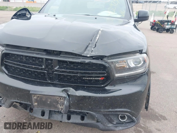 2014 Dodge Durango SXT with VIN 1C4RDJAG1EC552075, listed as a IAAI auction lot 42292301 with 122,427 mi miles and . Bid and sale history available at DreamBid. Image 6.