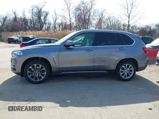 2015 BMW X5 xDrive35i with VIN 5UXKR0C53F0K60910, listed as a IAAI auction lot 41857733 with 153,583 mi miles. Bid and sale history available at carsss.com. Image 14.