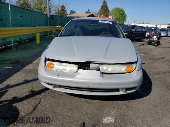2001 Saturn SL z VIN 1G8ZH52891Z317279, wystawiony jako Copart lot #55163885 z przebiegiem 136 029 mil mil oraz Nie do naprawy • Non repairable. Historia ofert i sprzedaży dostępna na DreamBid. Obrazek 5.