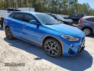 2018 BMW X2 xDrive28i with VIN WBXYJ5C38JEF78411, listed as a Copart auction lot 50469495 with 75,534 mi miles and Salvage Title. Bid and sale history available at carsss.com. Image 4.