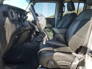 2020 Jeep Wrangler Unlimited Sahara Altitude with VIN 1C4HJXEN8LW209405, listed as a Copart auction lot 50297225 with 13,267 mi miles and Salvage title. Bid and sale history available at DreamBid. Image 7.