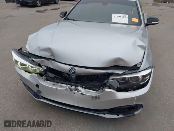 2018 BMW 4 Series 440i with VIN WBA4J5C57JBF07924, listed as a IAAI auction lot 41595682 with 75,121 mi miles and . Bid and sale history available at DreamBid. Image 6.