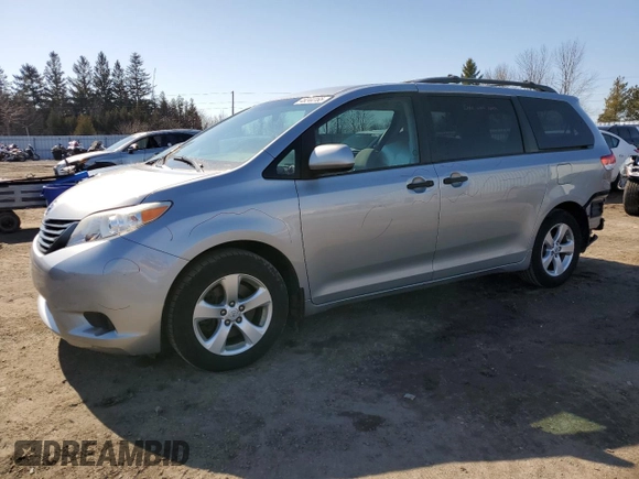 2014 Toyota Sienna L with VIN 5TDZK3DC9ES476369, listed as a Copart auction lot 48244165 with 123,574 mi miles and Salvage Title. Bid and sale history available at carsss.com. Image 1.