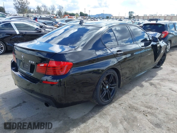 2014 BMW 5 Series 535i with VIN WBA5B1C58ED481934, listed as a IAAI auction lot 41793504 with 190,773 mi miles and . Bid and sale history available at DreamBid. Image 4.
