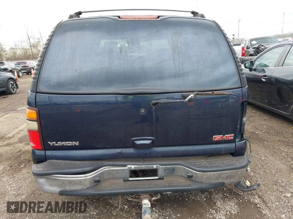 2004 GMC Yukon SLT with VIN 1GKEK13Z74R114583, listed as a IAAI auction lot 41834400 with 311,567 mi miles. Bid and sale history available at carsss.com. Image 16.