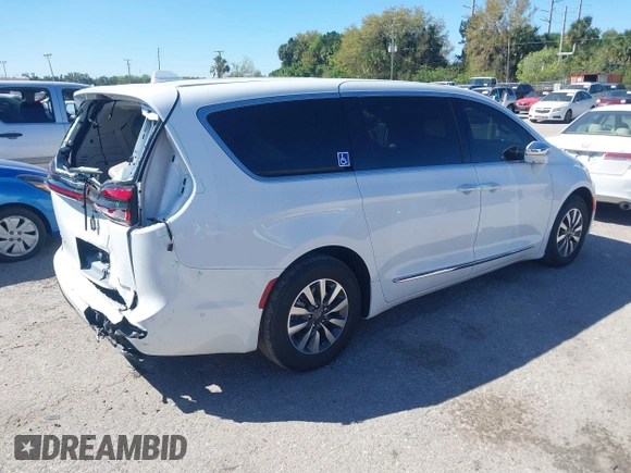 2022 Chrysler Pacifica Hybrid Limited with VIN 2C4RC1S74NR112960, listed as a IAAI auction lot 41584818 with 22,040 mi miles and . Bid and sale history available at DreamBid. Image 4.