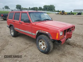 1999 Jeep Cherokee Sport with VIN 1J4FF68S4XL580048, listed as a Copart auction lot 62546365 with 154,059 mi miles and Clean title. Bid and sale history available at DreamBid. Image 4.