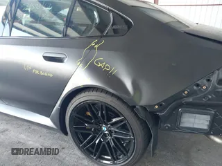 2025 BMW 5 Series with VIN WBS83FK04SCU11874, listed as a IAAI auction lot 42543784 with 4,517 mi miles and . Bid and sale history available at DreamBid. Image 18.