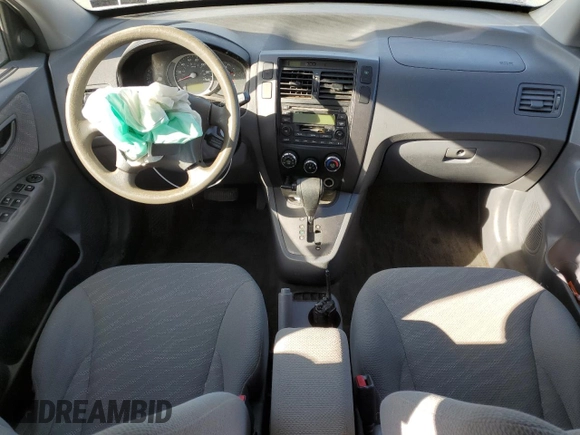 2005 Hyundai Tucson GL with VIN KM8JM12B95U067091, listed as a Copart auction lot 79297524 with Not Provided miles and Salvage Title. Bid and sale history available at carsss.com. Image 8.