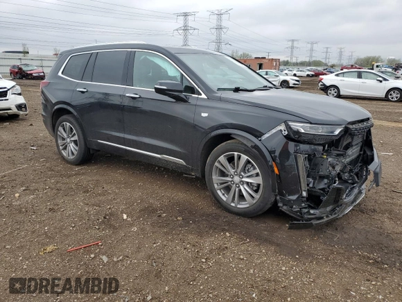 2022 Cadillac XT6 Premium Luxury z VIN 1GYKPFRS9NZ103281, wystawiony jako Copart lot #55118485 z przebiegiem 52 413 mil mil oraz Szkoda całkowita • Salvage title. Historia ofert i sprzedaży dostępna na DreamBid. Obrazek 4.