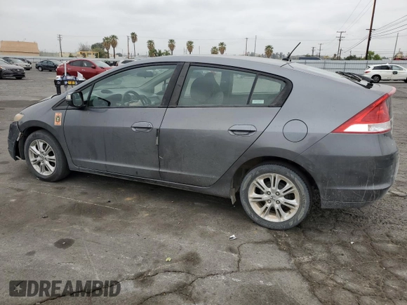 2010 Honda Insight EX with VIN JHMZE2H79AS017647, listed as a Copart auction lot 53311325 with 94,999 mi miles and Salvage Title. Bid and sale history available at DreamBid. Image 2.