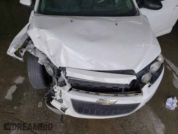 2016 Chevrolet Sonic LS z VIN 1G1JA6SH1G4174727, wystawiony jako Copart lot #47789335 z przebiegiem 166 907 mil mil oraz Szkoda całkowita • Salvage title. Historia ofert i sprzedaży dostępna na DreamBid. Obrazek 11.