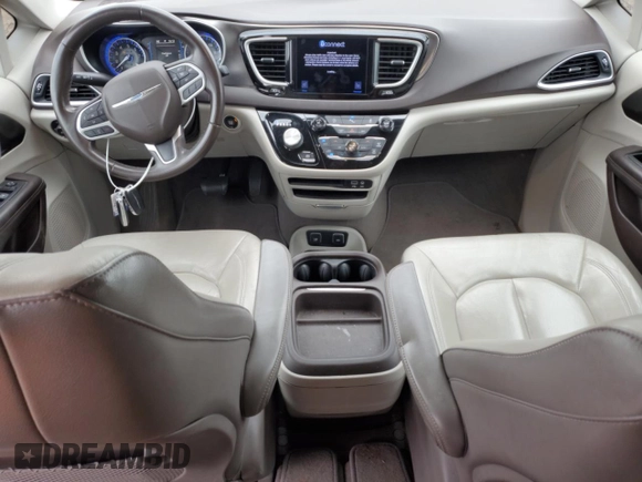 2017 Chrysler Pacifica Touring L with VIN 2C4RC1BG2HR734557, listed as a Copart auction lot 53630065 with 147,955 mi miles and Salvage Title. Bid and sale history available at DreamBid. Image 8.