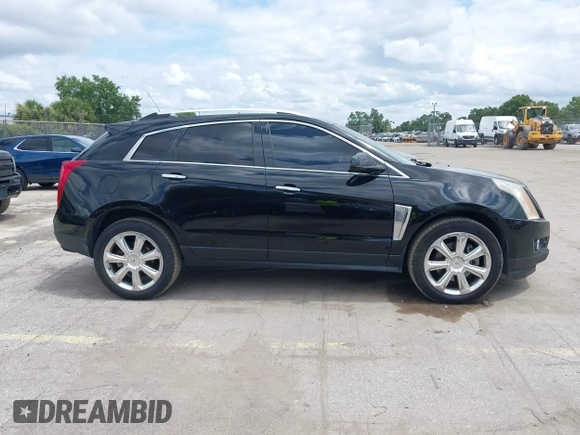 2015 Cadillac SRX Performance Collection z VIN 3GYFNCE31FS597798, wystawiony jako IAAI lot #42387793 z przebiegiem 159 986 mil mil oraz . Historia ofert i sprzedaży dostępna na DreamBid. Obrazek 13.