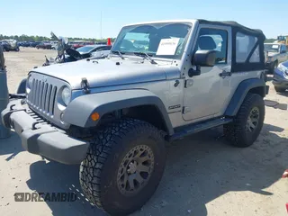 2015 Jeep Wrangler Sport with VIN 1C4AJWAG3FL696988, listed as a IAAI auction lot 41999036 with 79,064 mi miles. Bid and sale history available at carsss.com. Image 17.