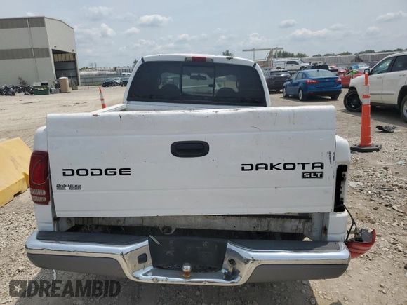 2004 Dodge Dakota SLT with VIN 1D7HL48K14S719751, listed as a Copart auction lot 64031654 with 288,226 mi miles and Salvage Title. Bid and sale history available at DreamBid. Image 6.