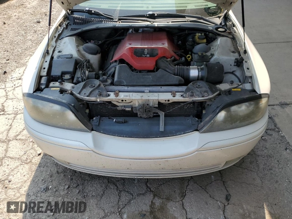 2005 Lincoln LS Sport z VIN 1LNHM87A05Y646745, wystawiony jako Copart lot #70427194 z przebiegiem Nie podano mil oraz Szkoda całkowita • Salvage title. Historia ofert i sprzedaży dostępna na DreamBid. Obrazek 11.