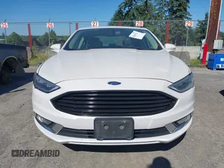 2017 Ford Fusion SE z VIN 3FA6P0HD3HR132779, wystawiony jako IAAI lot #42690212 z przebiegiem 165 293 mil mil oraz . Historia ofert i sprzedaży dostępna na DreamBid. Obrazek 12.