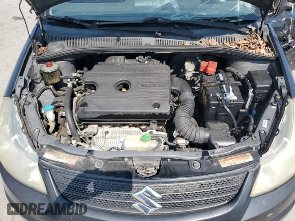 2009 Suzuki SX4 Man FWD with VIN JS2YA413496200847, listed as a Copart auction lot 71297264 with 146,621 mi miles and Salvage Title. Bid and sale history available at carsss.com. Image 12.