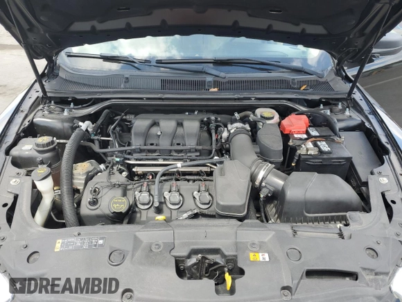 2015 Ford Taurus SE with VIN 1FAHP2D86FG140750, listed as a Copart auction lot 54390145 with 128,163 mi miles and Salvage Title. Bid and sale history available at carsss.com. Image 11.