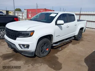 2018 Chevrolet Colorado 2WD Work Truck with VIN 1GCGSBEN3J1129192, listed as a IAAI auction lot 41784937 with 58,904 mi miles. Bid and sale history available at carsss.com. Image 2.