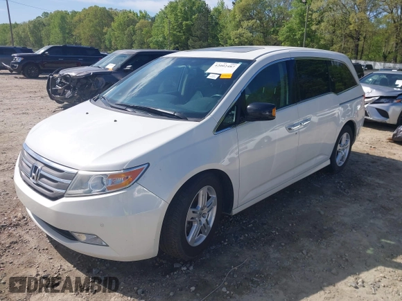 2013 Honda Odyssey Touring with VIN 5FNRL5H96DB009694, listed as a IAAI auction lot 42002487 with 182,867 mi miles and . Bid and sale history available at carsss.com. Image 17.
