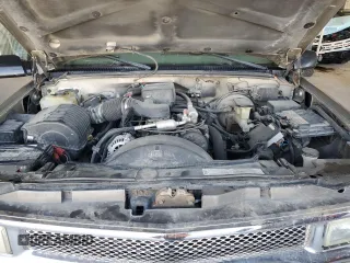 1999 Chevrolet Tahoe Z71 z VIN 1GNEK13R2XJ338897, wystawiony jako Copart lot #54219225 z przebiegiem 232 020 mil mil oraz Szkody całkowita. Historia ofert i sprzedaży dostępna na DreamBid. Obrazek 12.