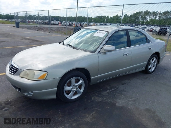 2002 Mazda Millenia with VIN JM1TA221721722364, listed as a IAAI auction lot 42160683 with 166,778 mi miles and . Bid and sale history available at DreamBid. Image 2.