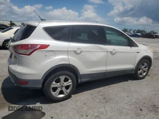 2013 Ford Escape SE z VIN 1FMCU0GX6DUD64499, wystawiony jako Copart lot #60971245 z przebiegiem 63 411 mil mil oraz Szkoda całkowita • Salvage title. Historia ofert i sprzedaży dostępna na DreamBid. Obrazek 3.