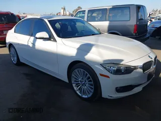 2015 BMW 3 Series 320i with VIN WBA3B1C50FK140256, listed as a IAAI auction lot 42151161 with 90,373 mi miles and . Bid and sale history available at DreamBid. Image 1.