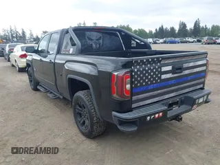 2017 GMC Sierra 1500 SLT z VIN 1GTV2NEC6HZ263312, wystawiony jako IAAI lot #42261269 z przebiegiem 164 282 mil mil oraz . Historia ofert i sprzedaży dostępna na DreamBid. Obrazek 3.
