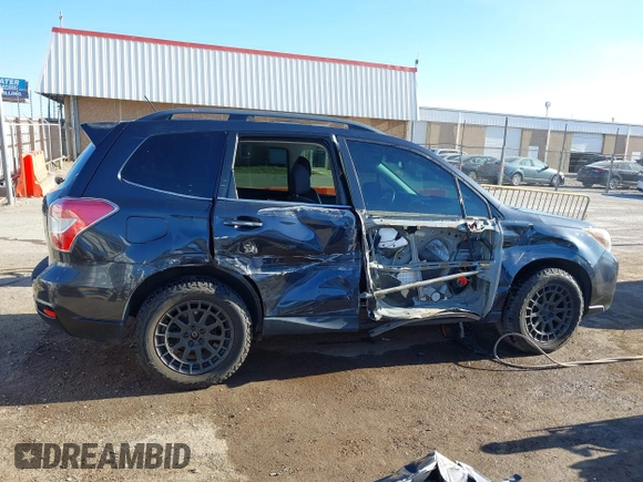 2015 Subaru Forester 2.0XT Premium with VIN JF2SJGDC2FH532994, listed as a IAAI auction lot 41797117 with 104,571 mi miles. Bid and sale history available at carsss.com. Image 14.