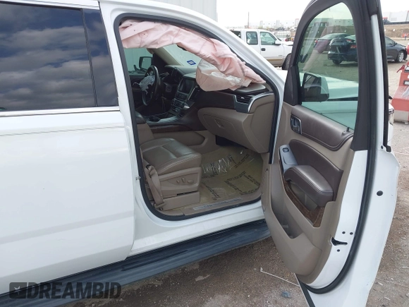 2015 Chevrolet Suburban LT with VIN 1GNSCJKC9FR702598, listed as a IAAI auction lot 41909771 with 150,206 mi miles and . Bid and sale history available at DreamBid. Image 5.