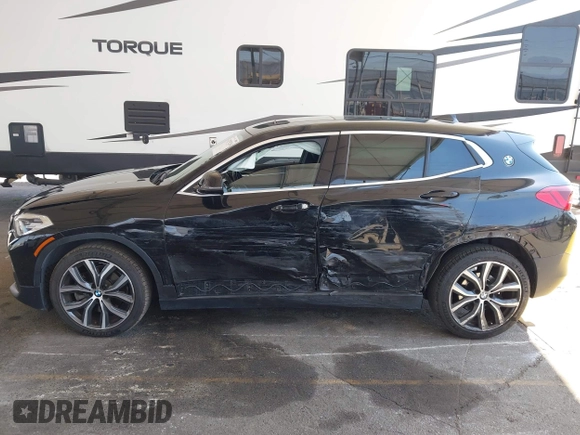 2018 BMW X2 sDrive28i with VIN WBXYJ3C32JEJ84291, listed as a IAAI auction lot 42575234 with 65,081 mi miles and . Bid and sale history available at DreamBid. Image 6.