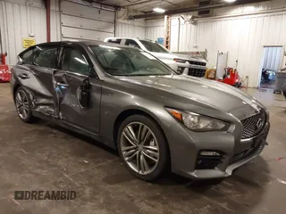 2014 Infiniti Q50 Premium with VIN JN1BV7ARXEM699902, listed as a IAAI auction lot 42135410 with 103,929 mi miles and . Bid and sale history available at DreamBid. Image 1.