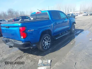 2023 Chevrolet Colorado 4WD Z71 with VIN 1GCPTDEKXP1247067, listed as a IAAI auction lot 41760802 with 21,259 mi miles. Bid and sale history available at carsss.com. Image 4.