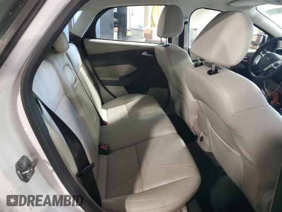 2014 Ford Focus Electric z VIN 1FADP3R45EL344648, wystawiony jako Copart lot #57118335 z przebiegiem 60 347 mil mil oraz Szkoda całkowita • Salvage title. Historia ofert i sprzedaży dostępna na DreamBid. Obrazek 10.