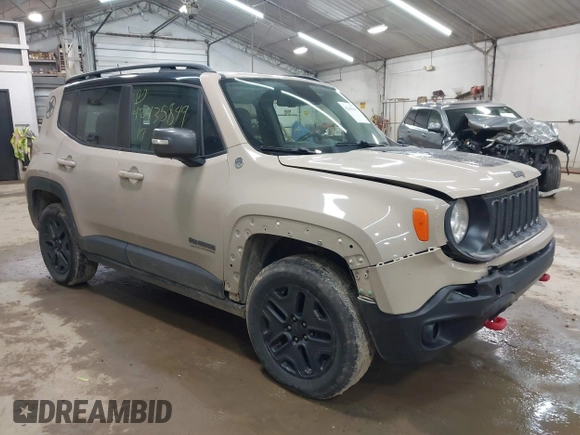 2017 Jeep Renegade Trailhawk z VIN ZACCJBCB6HPE97998, wystawiony jako IAAI lot #42435849 z przebiegiem 105 490 mil mil oraz . Historia ofert i sprzedaży dostępna na DreamBid. Obrazek 1.