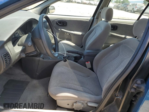 2000 Saturn SL with VIN 1G8ZK5271YZ184701, listed as a Copart auction lot 61598135 with 123,309 mi miles and Salvage title. Bid and sale history available at DreamBid. Image 7.