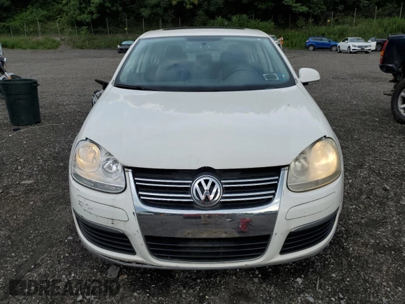 2009 Volkswagen Jetta SE with VIN 3VWRZ71K69M120110, listed as a Copart auction lot 64813905 with 114,552 mi miles and Salvage title. Bid and sale history available at DreamBid. Image 5.