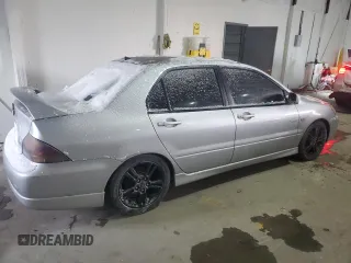 2006 Mitsubishi Lancer with VIN JA3AJ66F46U057530, listed as a Copart auction lot 87750605 with 180,243 mi miles and Salvage Title. Bid and sale history available at DreamBid. Image 3.