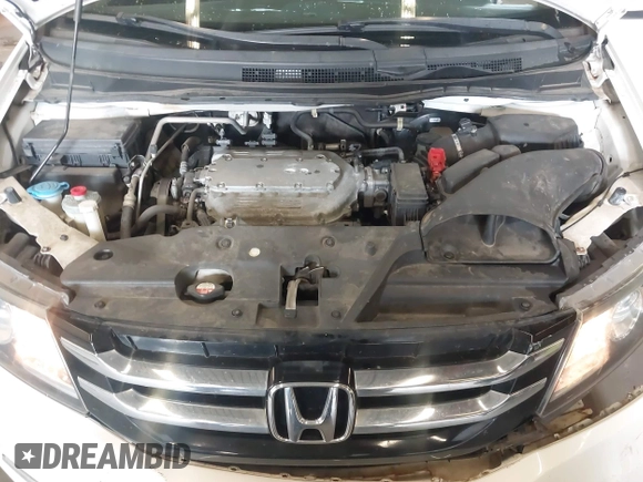 2014 Honda Odyssey EX-L with VIN 5FNRL5H60EB030841, listed as a IAAI auction lot 42271401 with 107,343 mi miles and . Bid and sale history available at DreamBid. Image 10.