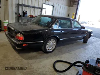 2001 Jaguar XJ with VIN SAJDA25B01MF26440, listed as a Copart auction lot 83933224 with 124,873 mi miles and Clean Title. Bid and sale history available at DreamBid. Image 3.