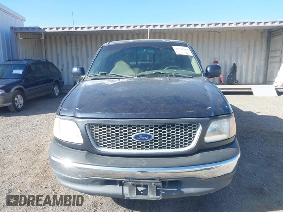 1999 Ford F-150 XL with VIN 1FTRX17L5XKB39130, listed as a IAAI auction lot 42041520 with Not Provided miles. Bid and sale history available at carsss.com. Image 6.