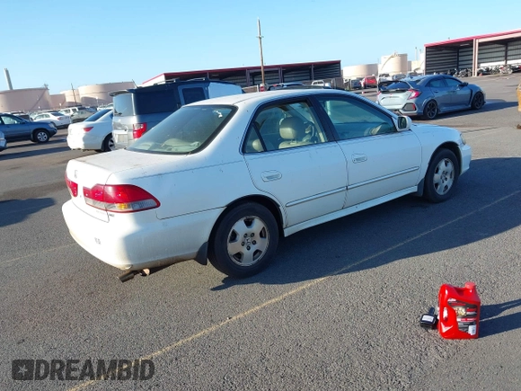 2002 Honda Accord EX z VIN 1HGCG16522A024557, wystawiony jako IAAI lot #41525344 z przebiegiem 219 786 mil mil oraz . Historia ofert i sprzedaży dostępna na DreamBid. Obrazek 4.