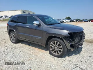 2018 Jeep Grand Cherokee High Altitude with VIN 1C4RJECG8JC239080, listed as a Copart auction lot 62141205 with 66,126 mi miles and Salvage title. Bid and sale history available at DreamBid. Image 4.