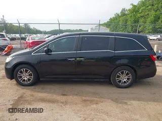 2011 Honda Odyssey EX-L with VIN 5FNRL5H68BB071178, listed as a IAAI auction lot 42286324 with 213,847 mi miles and . Bid and sale history available at DreamBid. Image 14.